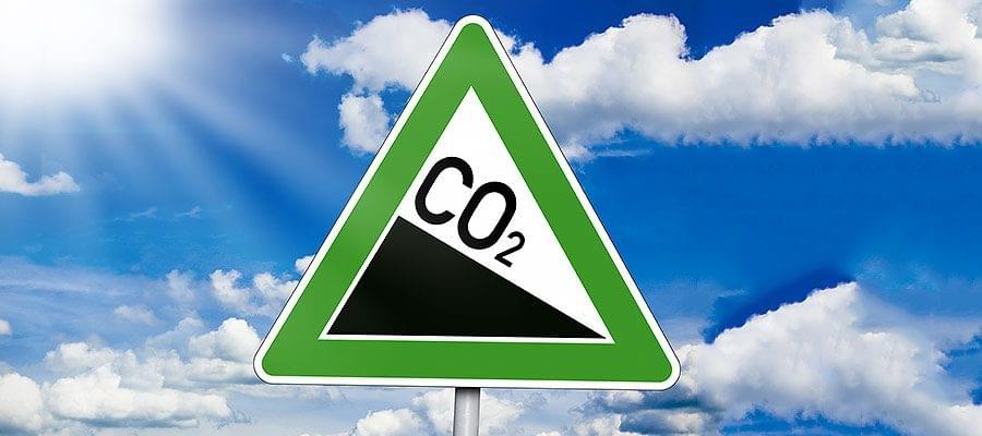 Schild CO2 Ausstoß verringern